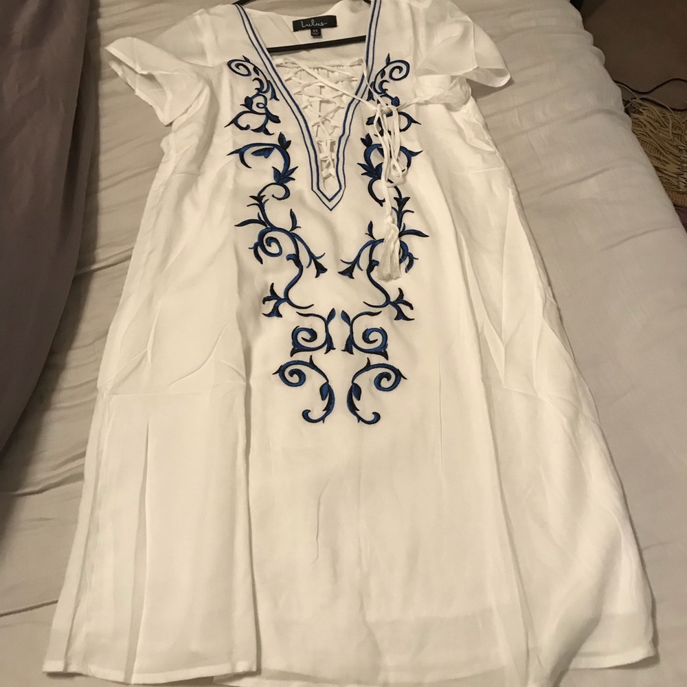 Very cute, flowy, white dress with design
